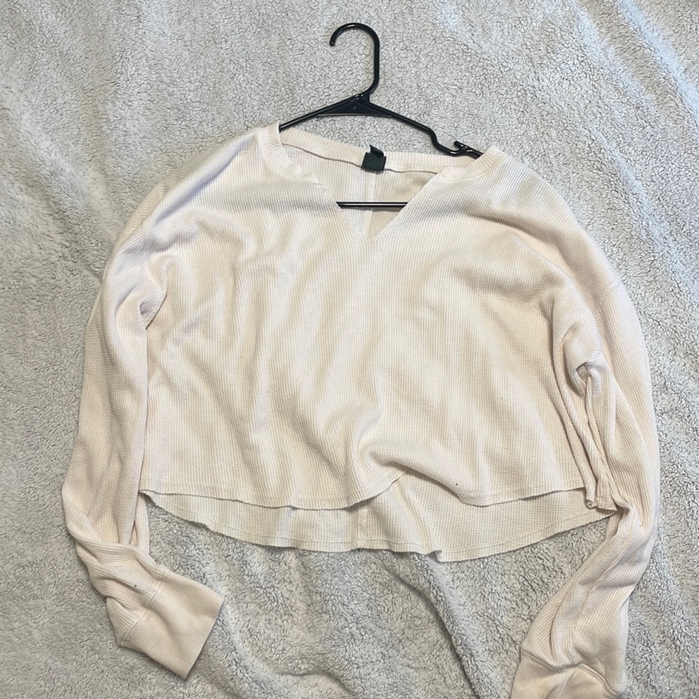 A fun, beach’s, off-white color shirt very light material